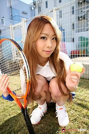 Cute looking Asian tennis player Remika Uehara is flashing panty up skirt