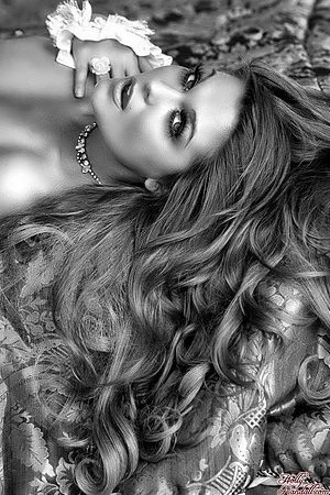 Leggy long haired beauty goddess Adrienne Manning bares it all in glamour black and white gallery