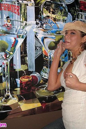 Melissa Midwest plays with cock and flashes her classy tits and bald pussy