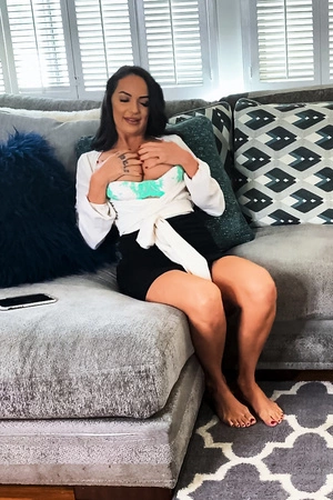 Sofi Ryan plays with her tight pussy in the living room