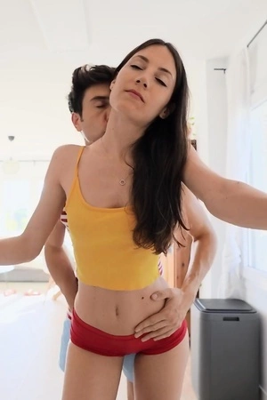 Young housewife with natural tits pleases her man in the kitchen