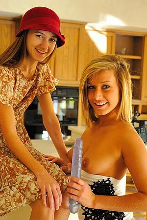 Kennedy Leigh and another teen cutie in wild lesbian scene with passionate kisses and toying action