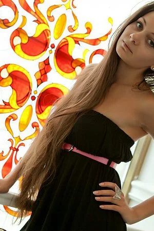 Beautiful teen Ennu A is gonna reach the strong orgasm when playing with her shaved beaver