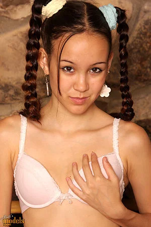 Barely legal asian girl Tiny Tabby with bald snatch and itty-bitty tits gets undressed