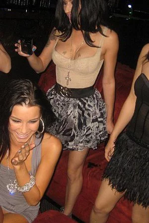 Exquisite party teen Tanner Mayes takes care of stripper's cock in front of her friends in a club