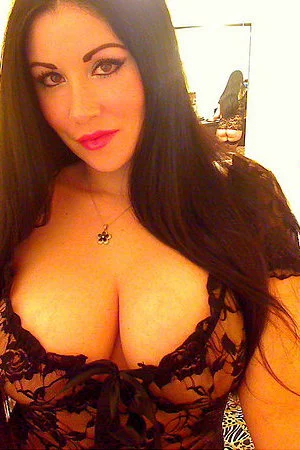 Vicious big titted brunette Sweet Krissy is performing horny handbra on camera