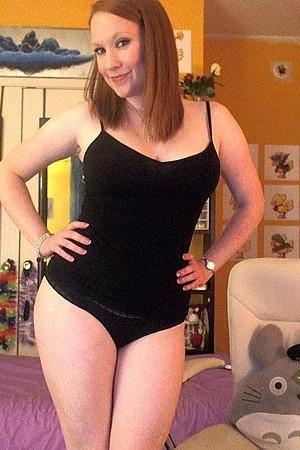 Piping hot redhead Lucy OHara lubes up her toy and teases her trimmed, ginger vagina.