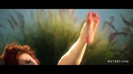 Elle Alexandra is an impossibly hot redhead babe and she is being naughty in a softcore vid