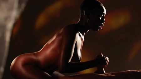 Bald-headed ebony with natural boobs gets fucked in the dark