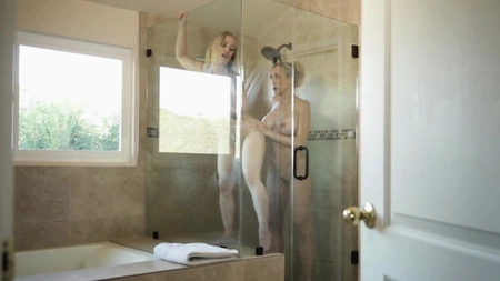 Brandi Love pleasures young blondie in the bathroom